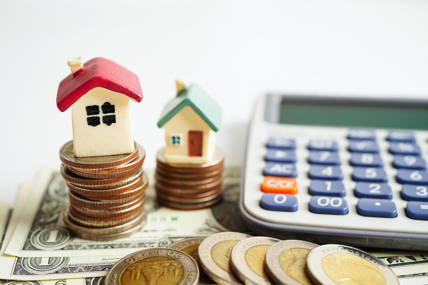 house-on-coins-money-saving-bank-real-estate-investment-free-photo