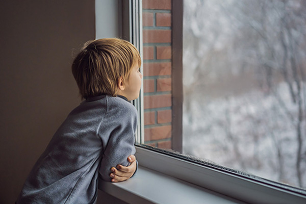 6148f5394f2b577d5e68e960_boy-window